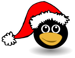 Funny tux face with Santa Claus hat
